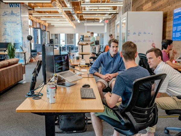Funding advisors reviewing lending options together