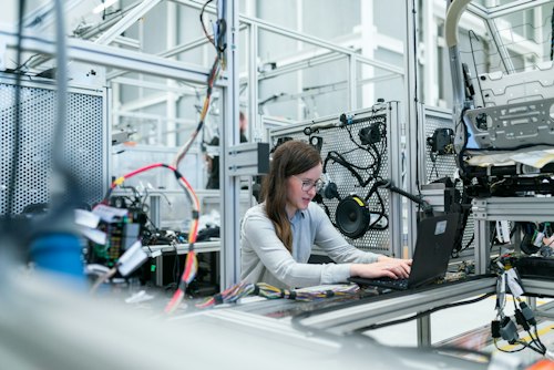 Technician working with business equipment
